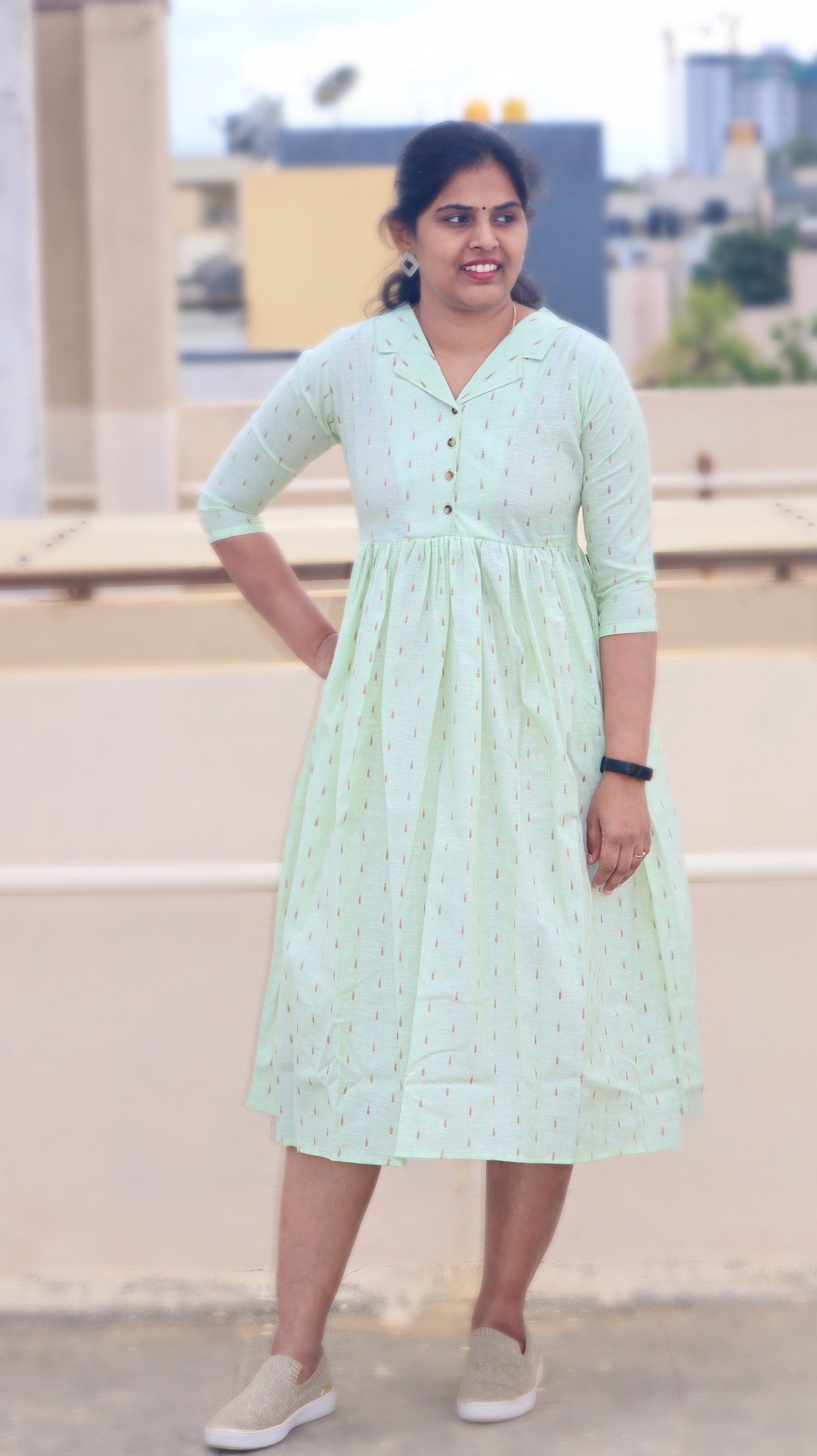 Cotton dress with front openable buttons